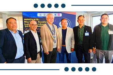 Six men in business attire posing for a photo at a conference, with a blue banner behind them.