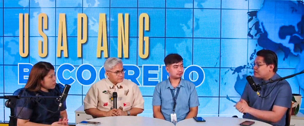 Four panelists sit at a white round table with microphones, discussing on a studio set with a blue digital backdrop reading 'USAPANG'.] ,