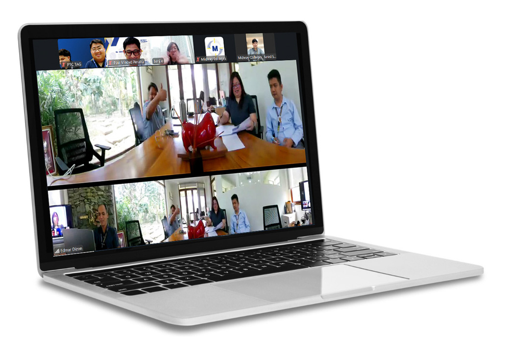 Midway Colleges-4 | PTC Laptop displaying a two-panel video conference with participants around a table in a meeting room