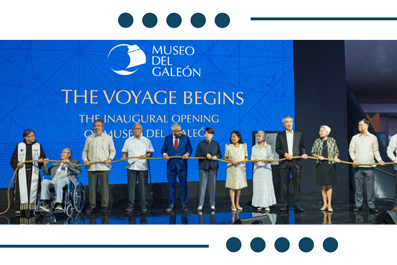 Ribbon-cutting ceremony on stage at the Museo del Galeón inaugural opening event, with a line of speakers and attendees.