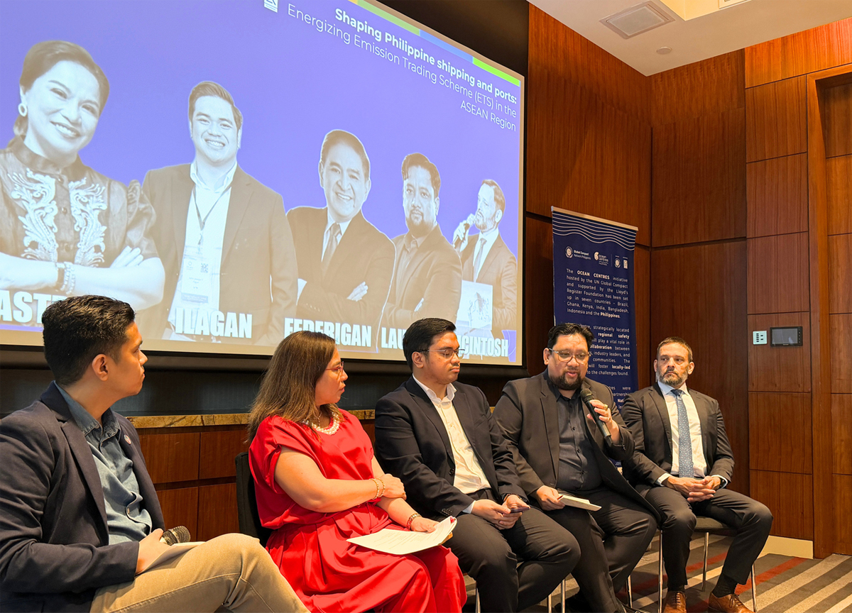 PTC Group participated in HALAGA-2 | PTC Panel of five professionals in business attire seated on stage during a discussion, with a large screen behind them showing a blue-tinted image and names.