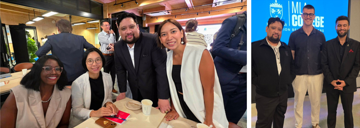 digital transformation at Singapore Maritime Week-4 | PTC Group of four diverse professionals at a table during a networking event: two women seated in white blazers with a man and another woman standing beside them, all smiling at the camera. In the background, other attendees are mingling.