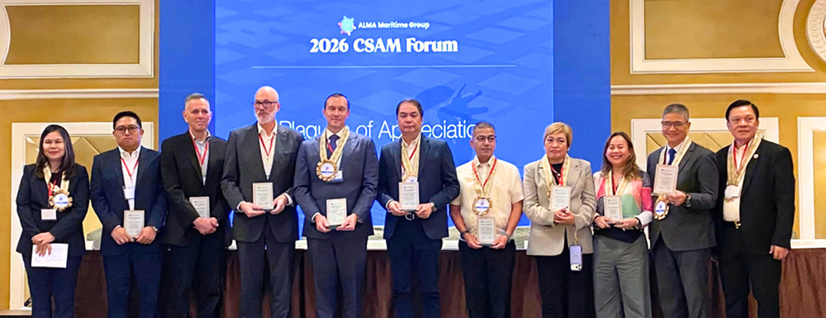 cyber ethics and seafarer protection-2 | PTC Diverse group of professionals on stage holding plaques and medals at a 2026 CSAM Forum event against a blue backdrop reading 2026 CSAM Forum and 'Plaque of Appreciation'.