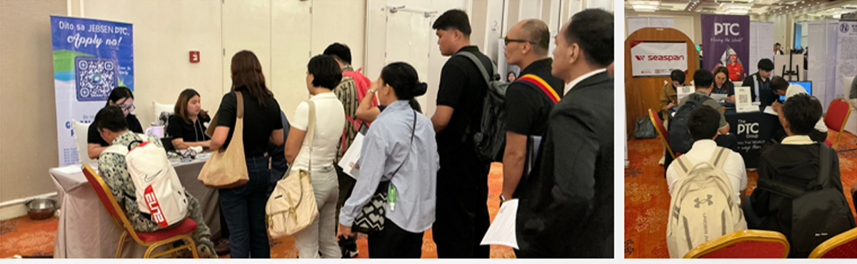 People queue at an expo registration desk with a QR poster nearby; staff assist attendees seated at the desk area.